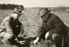 Hugh Hammond Bennett (right), first chief of the Soil Conservation Service, on a farm in Washington, DC circa 1951.