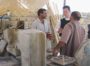 Sean Jones (MPP '00) with a tile shop owner in Fallujah, Iraq (2006).