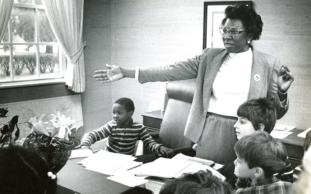 Sherry Suttles with her son and his classmates