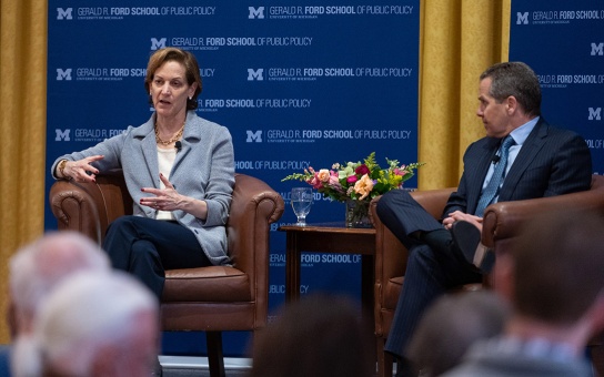 Photo of Anne Applebaum and Michael Barr in conversation on stage before an audience of Policy Talks attendees