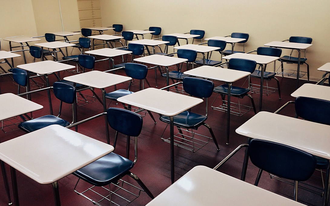 Empty desks in a classroom