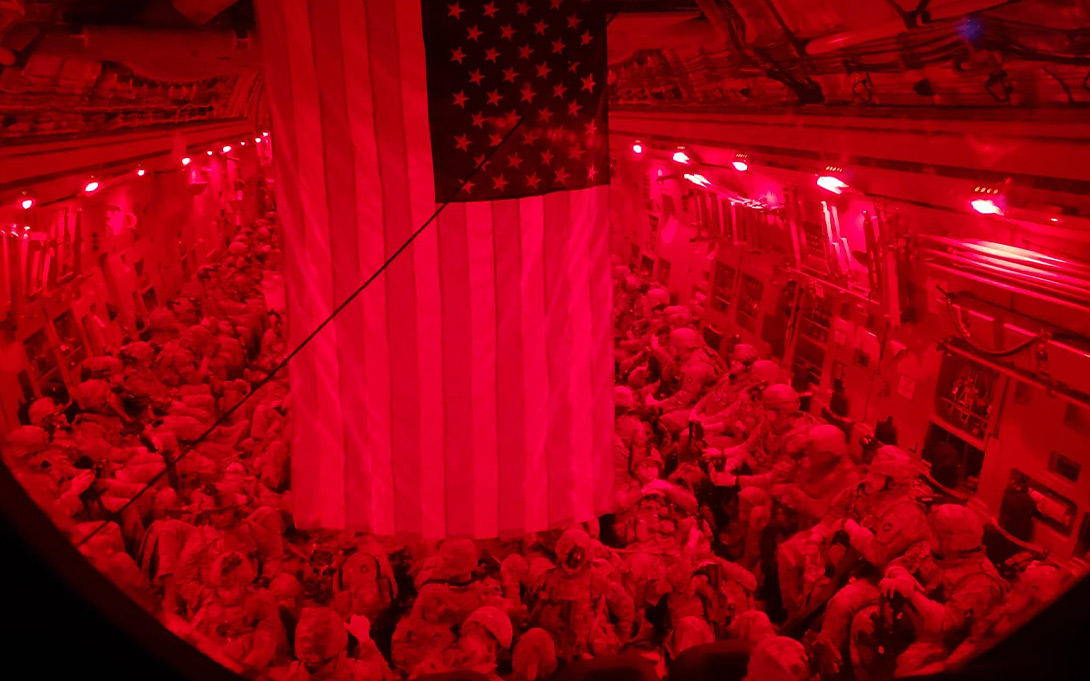 Photo of the interior of a U.S. military cargo plane filled with American and allied evacuees (credit: Minnesota National Guard / Lt. Col. Jake Helgestad)