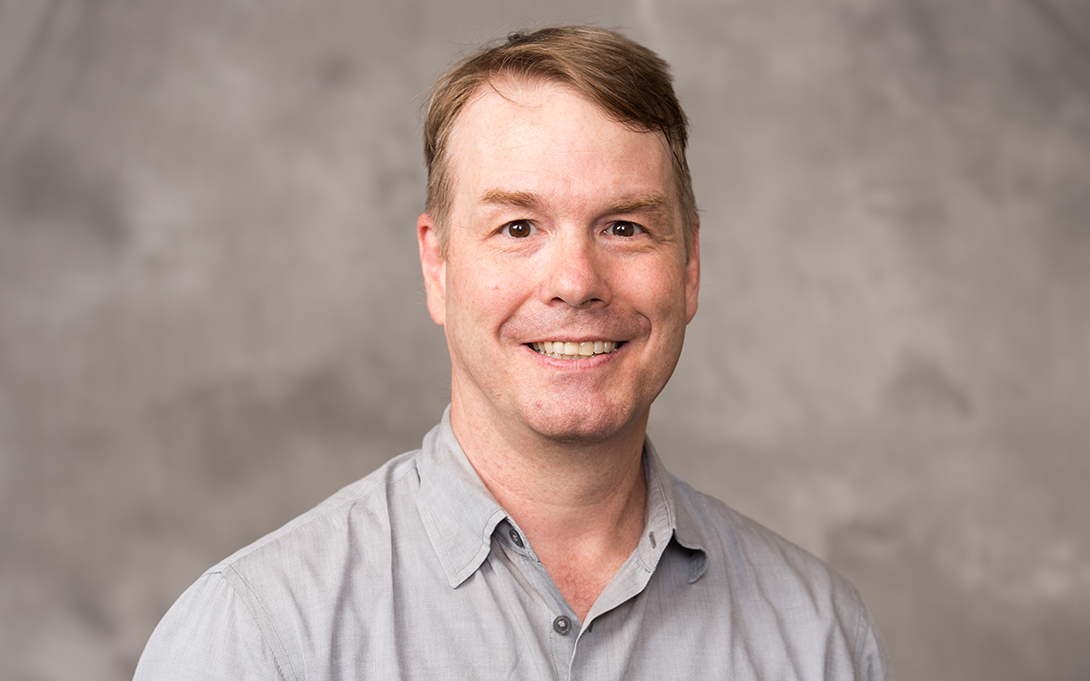 Headshot of John Leahy