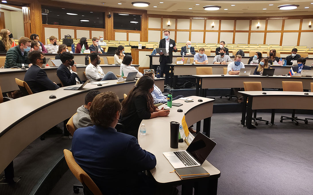 Photo of students seated in Annenberg Auditorium for the US Army War College simulation