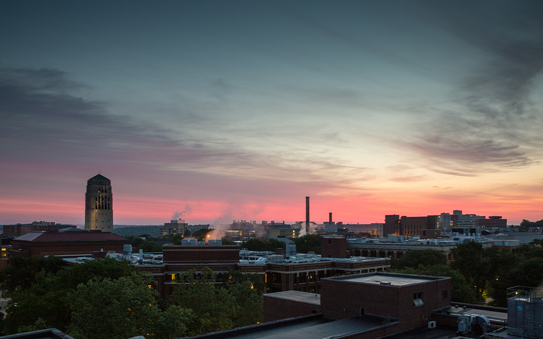 Photo of the sun rising over the  U-M campus
