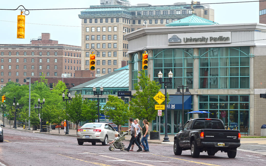 Photo of a road and crosswalk in Flint near the University Pavillion