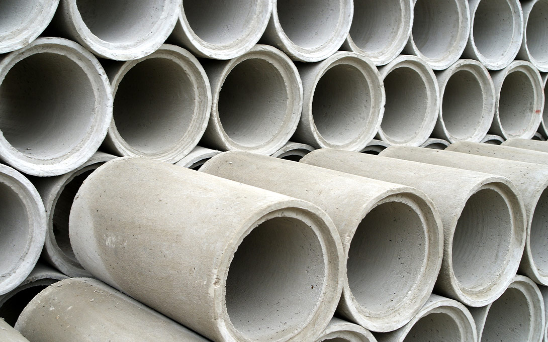 Photo of stacks of concrete pipes