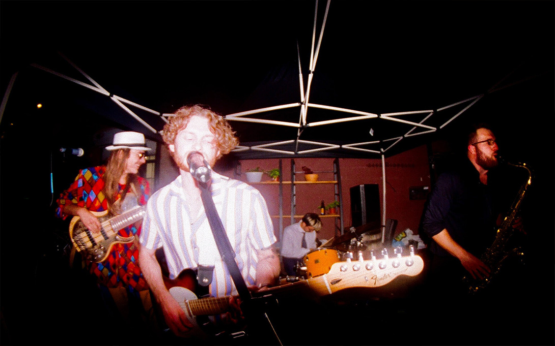 Kaj Althaus playing guitar