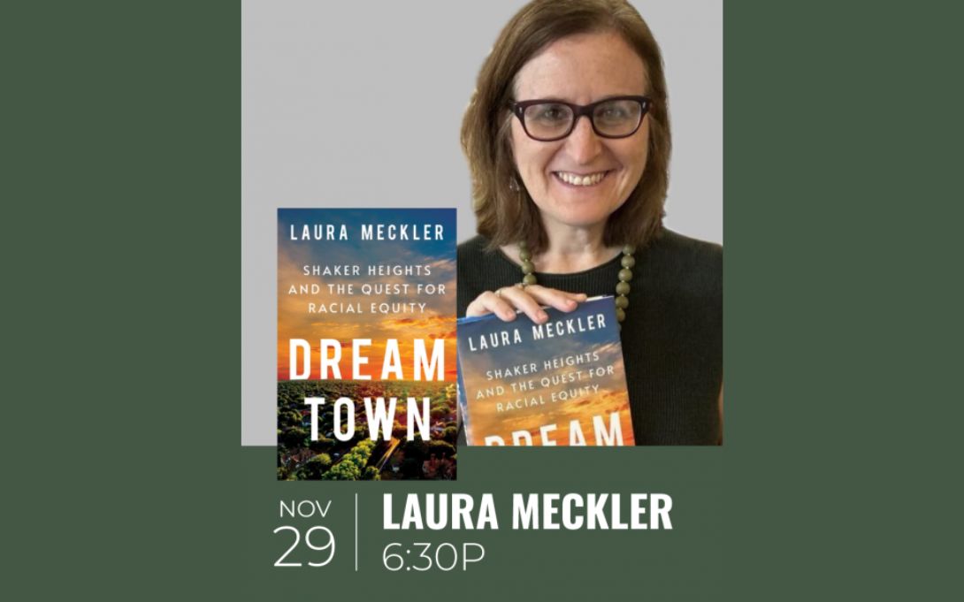 author laura meckler holding her book dream town: shaker heights and the quest for racial equity