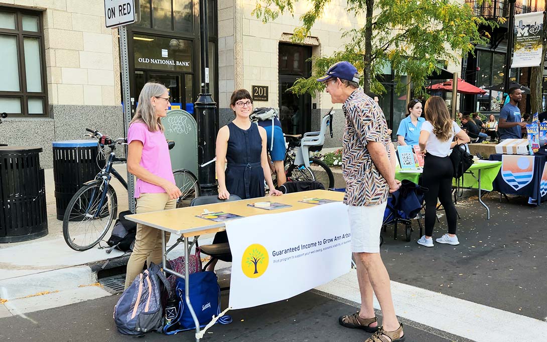 Seefeldt and Emily Shupp Parker tabling outside for GIG A2