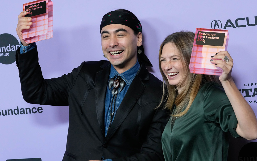 (Francisco Kjolseth | The Salt Lake Tribune) Julian Brave NoiseCat and Emily Kassie celebrate for Directing U.S. Documentary “Sugarcane” at the Sundance Film Festival Awards Ceremony in Park City, on Friday, Jan. 26, 2024.