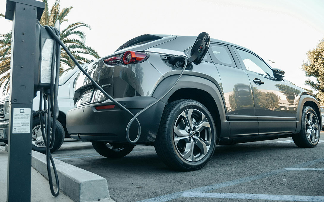 Gray Electric Car Parked on a Charging Bay