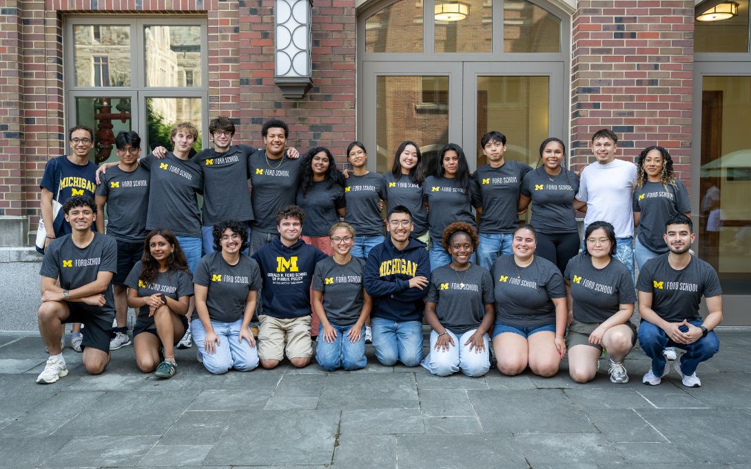 24 members of 2025 ppia jsi cohort posing outside a brick building