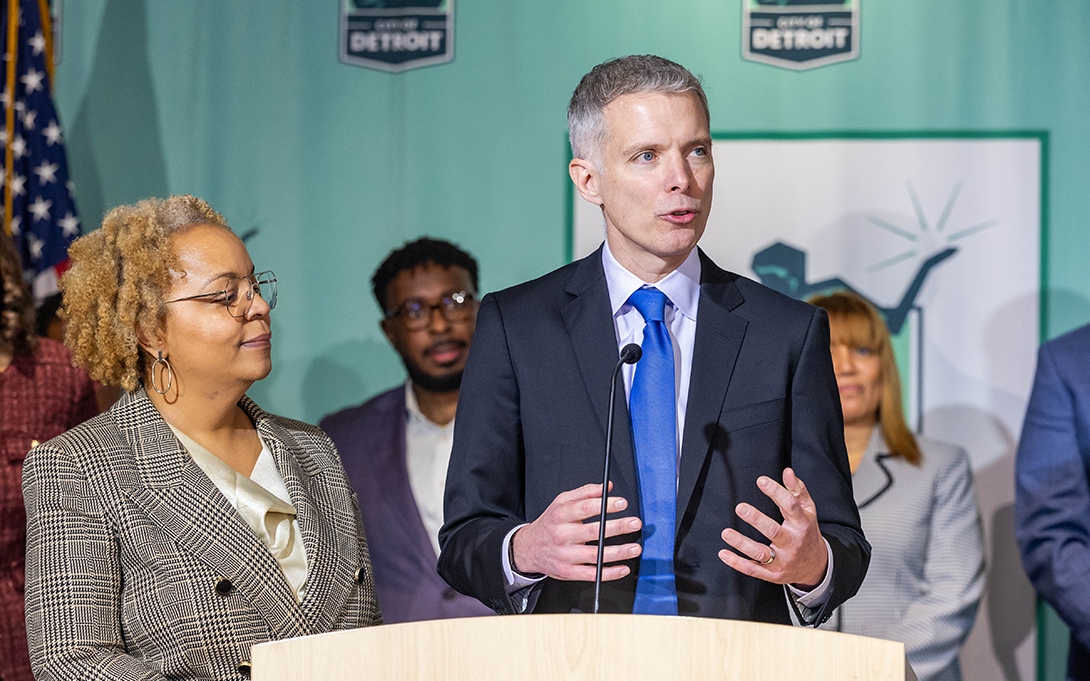 Luke Shaefer standing at podium giving speech during a press conference