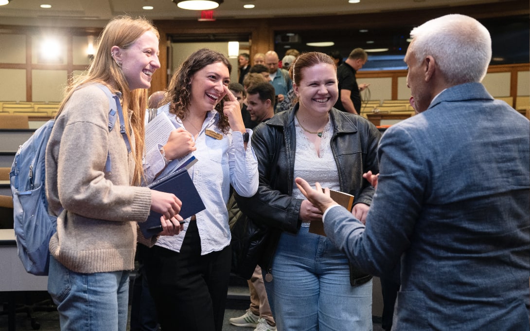 Thea Zellmer and students in a chat with Ford School professor Javed Ali and colleagues.