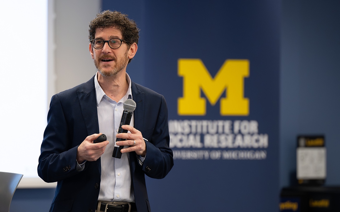 Brian Jacob speaking at a conference