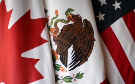 Close up photo of the flags for Canada, Mexico, and the United States