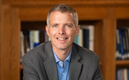 Photo of Luke Shaefer in the Ford School's Towsley Reading Room