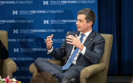 Person speaking at a Gerald Ford School of Public Policy event.