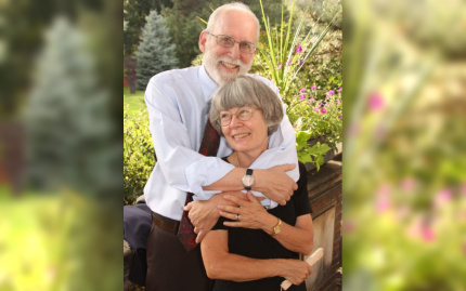Photo of Lenore K. and Robert Damrauer in a sunny garden