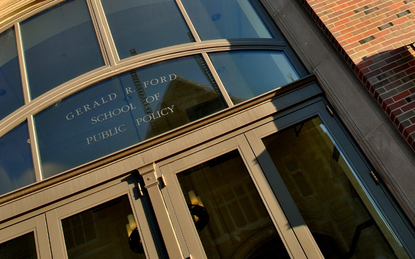 Weill Hall entrance with "Gerald R. Ford School of Public Policy" etched into the glass