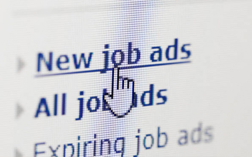 Photo of a computer screen displaying an online listing of job ads
