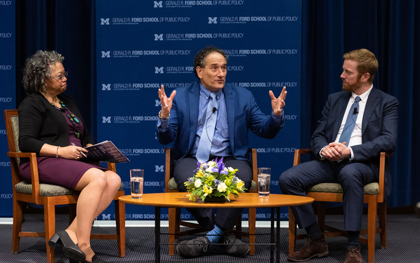 Former U.S. Representatives Andy Levin (D-MI) and Peter Meijer (R-MI), with Ambassador Susan Page ▼