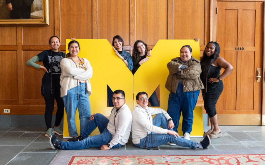 students of color in public policy graduation celebration