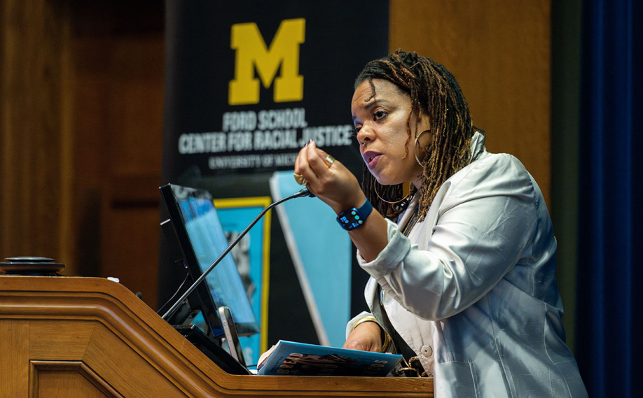 Airea D. Matthews performing her poetry at an event in Weill Hall