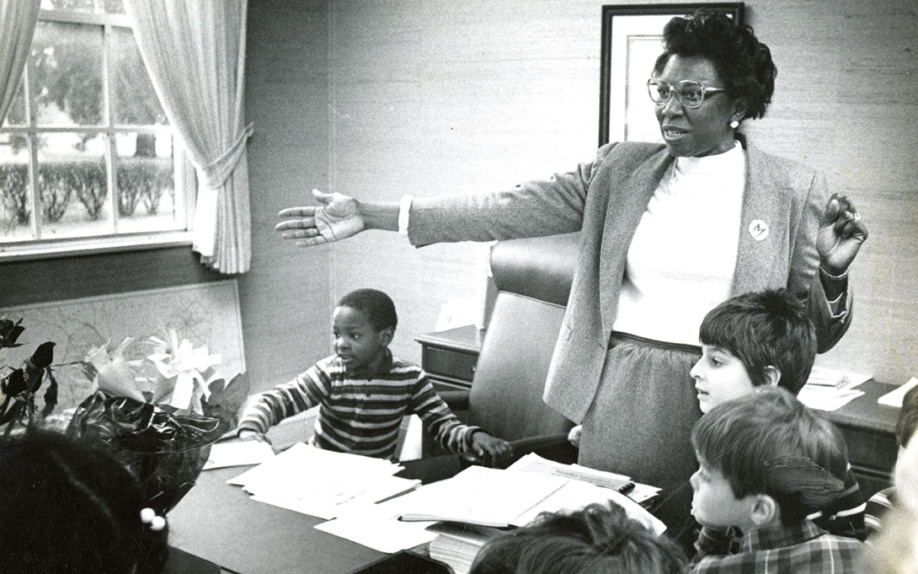 Sherry Suttles with her son and his classmates
