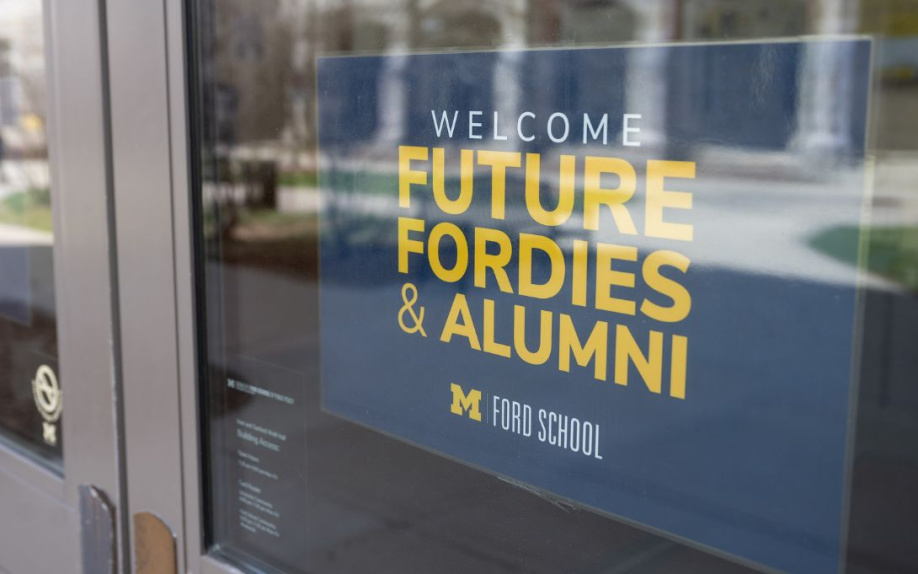 Welcome Future Fordies & Alumni" sign on the glass door of the Ford School.