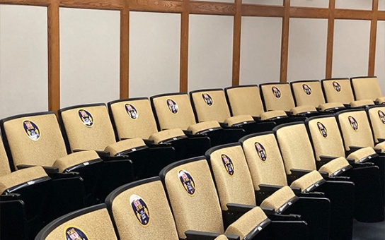 Annenberg Auditorium seats are marked to help students maintain social distancing in the classroom