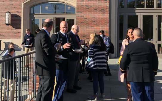 People gathered on Weill Hall's Stern Plaza as part of the US Army War College simulation