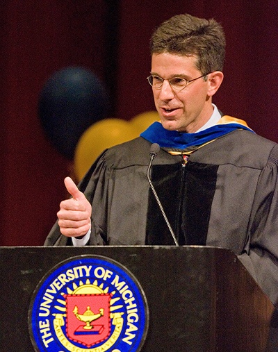 Photo of Bob Schoeni delivering remarks to the Ford School graduating classes of 2007