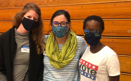 Photo of three Fordies volunteering at the polls