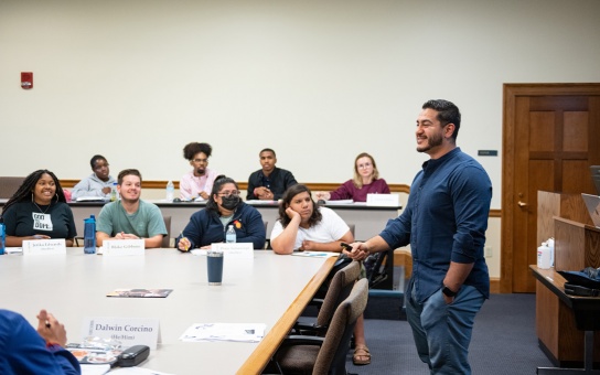 Photo of Abdul El-Sayed in front of a classroom of Ford School PPIA fellows