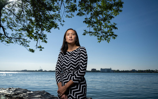 Photo of Stephanie Chang along the Detroit river