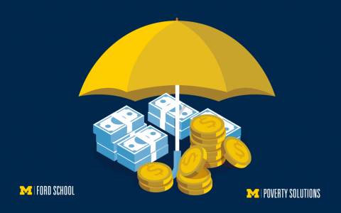 Maize and blue umbrella covering coins and dollars