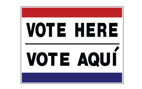 A sign that says "Vote here, vote aqui"